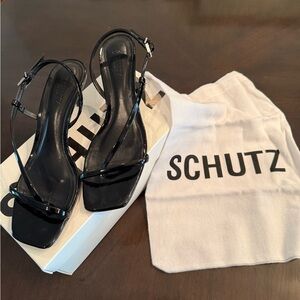 Size 8.5 Schutz black patten kitten strappy  heel